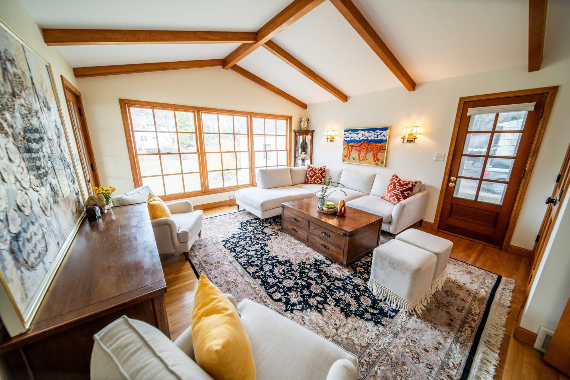 The same living room in a bright, wide professional listing photo